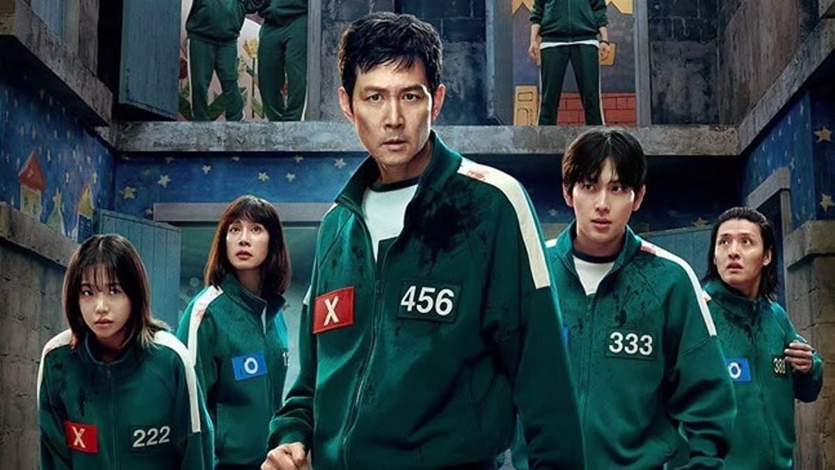 Squid Game main cast promotional poster featuring contestants in survival uniforms